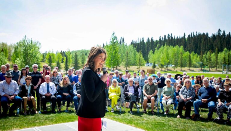 Danielle Smith speaking to Albertans at an outdoor town hall